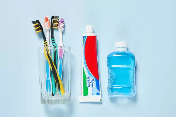 Flat lay composition with toothbrushes and oral hygiene products