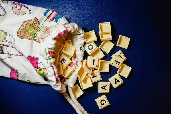 Flat lay of scrabble scattered