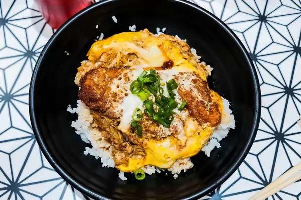 Flat lay shot of pork katsudon (Flip 2019)