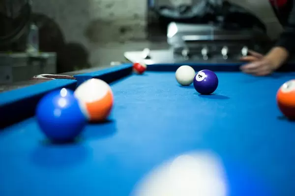 Focused pool 4 ball on a pool table