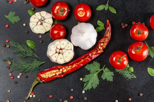 Food background with fresh vegetables, herbs and spices