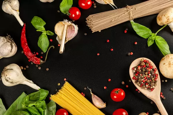 Food background with ingredients for cooking spaghetti or noodles