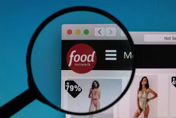 Food Network logo under magnifying glass