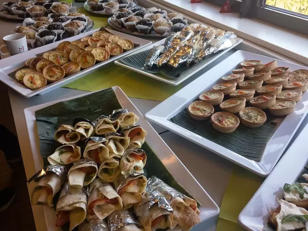 Food Photo of Buffet with Wraps, Mini Vegetable Pies and Muffins