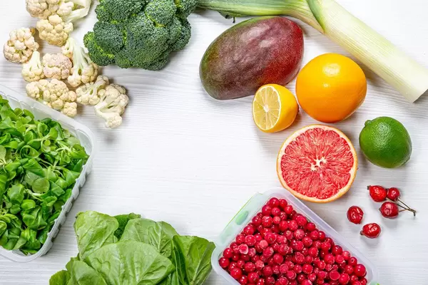 Foods rich to vitamin C. Top view with free space in the middle (Flip 2019)