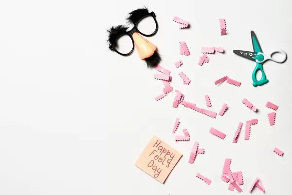 fools day background concept with holiday accessories, April 1st themed party attributes