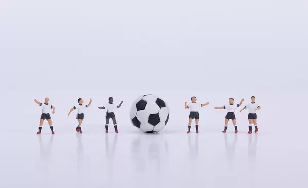 Football players and ball on white background