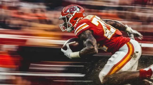 Football-Spieler in Aktion beim Sprinten mit dem Ball