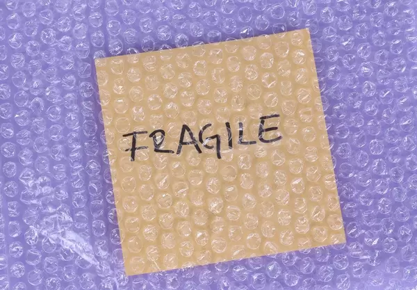 Fragile label under bubble wrap