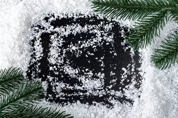 Frame of snow and Christmas tree branches with free space (Flip 2019)