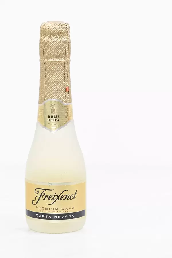 Freixenet bottle vine isolated above white background