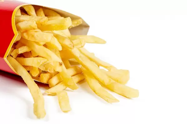 French fries on white, close up