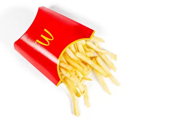 French fries poured out of the box, top view