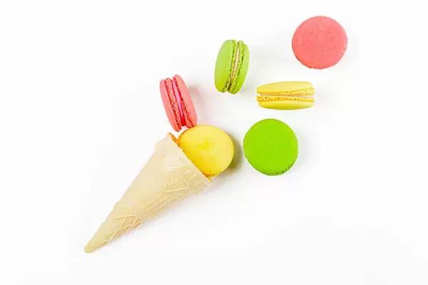 French macaroons dessert with waffle cone