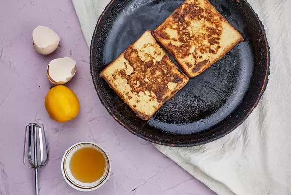 French toast breakfast with a mug of tea