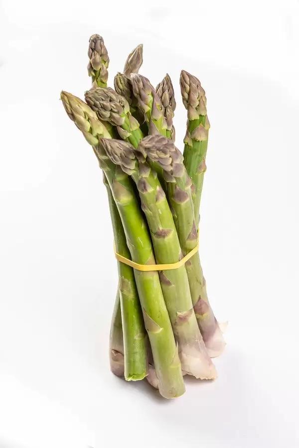 Fresh Asparagus above white background (Flip 2019)