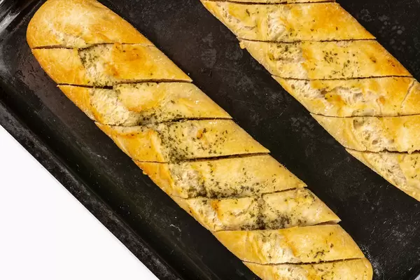 Fresh baked Bread Bruschetta on the baking tray