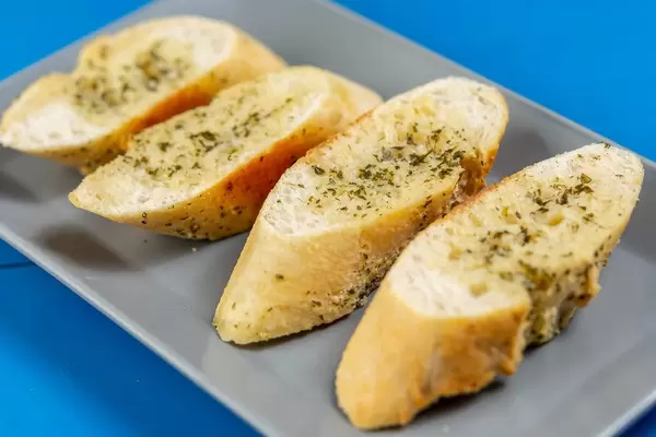 Fresh baked Bread Bruschetta on the square plate (Flip 2019)