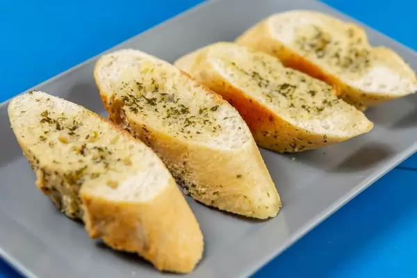 Fresh baked Bread Bruschetta on the square plate