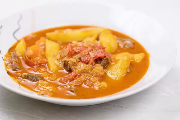 Fresh Beef Stew served in the white plate