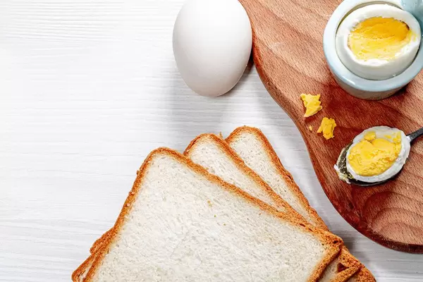 Fresh boiled chicken eggs and toast bread (Flip 2019)