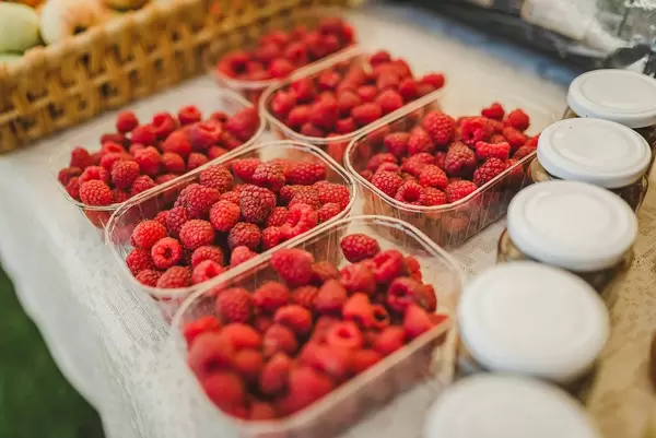Fresh Boxes Of Rasberries On Martketplace