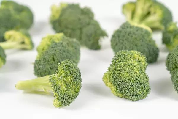 Fresh Broccoli on the white table (Flip 2020)