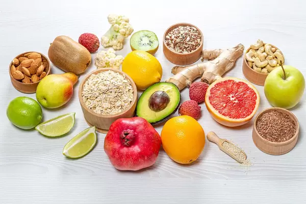 Fresh fruit, nuts, seeds and oatmeal. Healthy food background (Flip 2019)