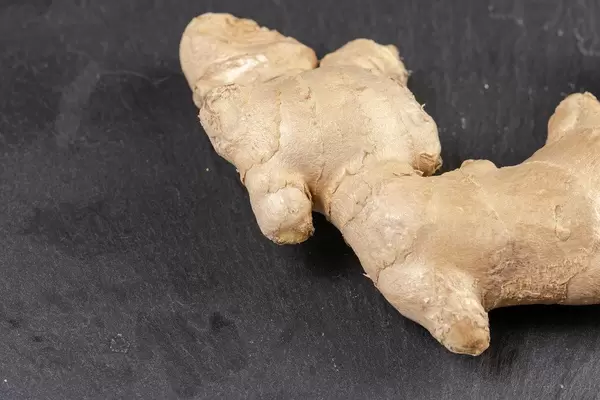 Fresh Ginger on the black stone tray