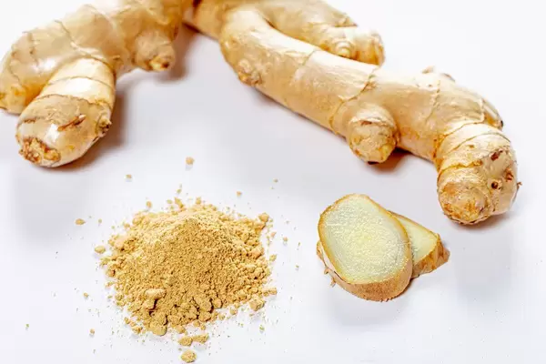 Fresh ginger root, slices and ground on white background (Flip 2019)