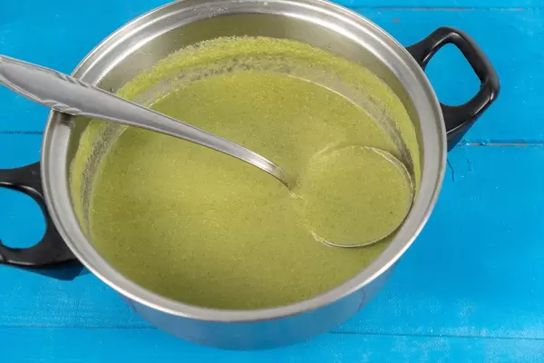 Fresh Green Broccoli soup in the pot (Flip 2020)