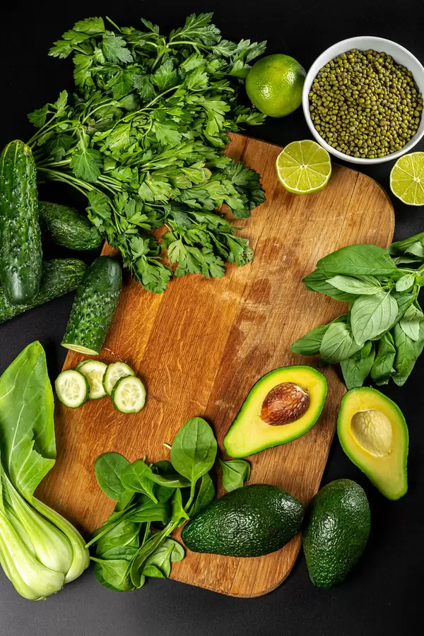 Fresh green vegetables and herbs, healthy food concept