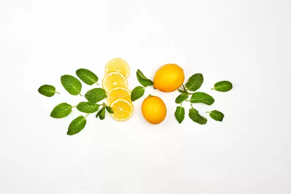 Fresh lemons on white background