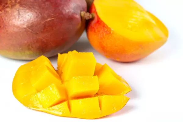Fresh mango fruits on white background