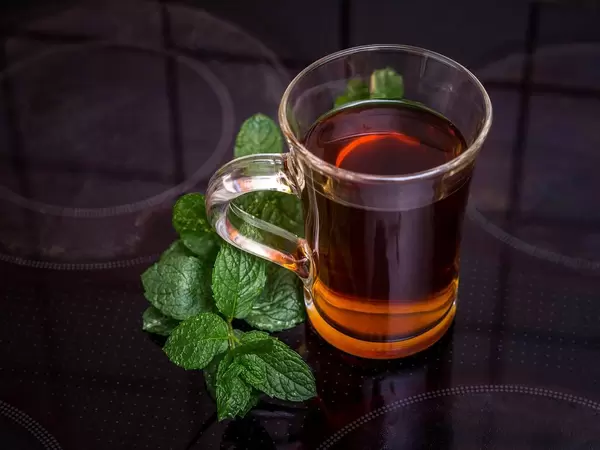 Fresh mint tea on the hotplate