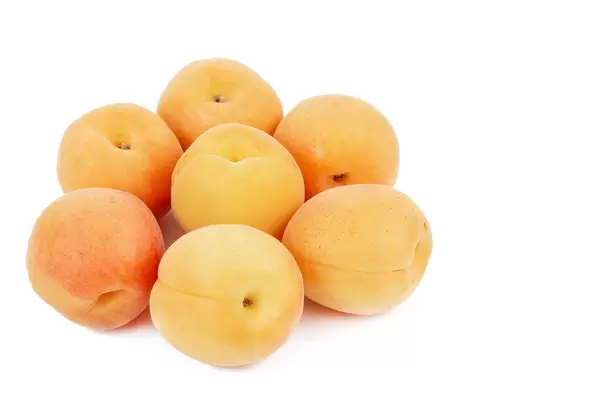 Fresh raw Apricots isolated above white background (Flip 2019)