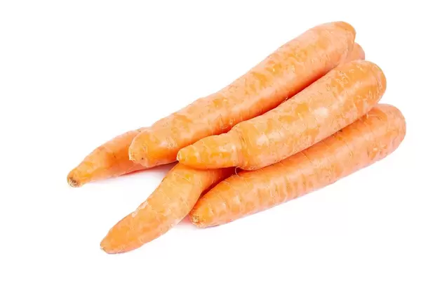 Fresh Raw Carrots isolated above white background