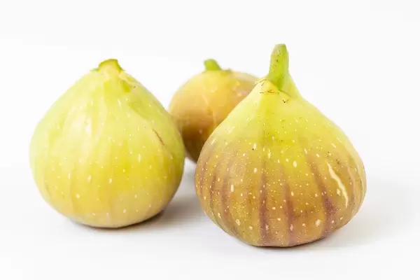 Fresh raw Figs isolated above white background (Flip 2019)