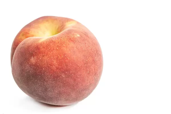 Fresh Raw Peach isolated above white background (Flip 2019)