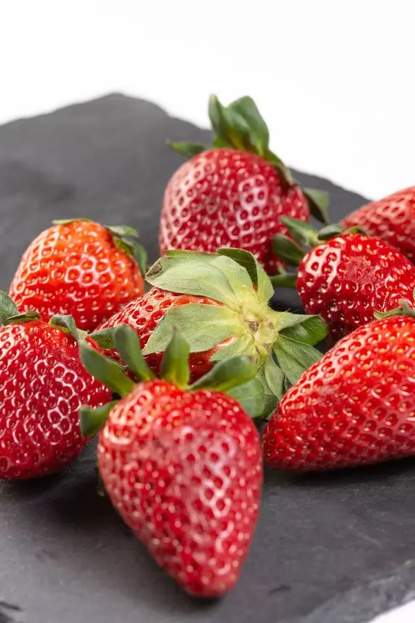 Fresh Red Strawberries on the black tray (Flip 2019)