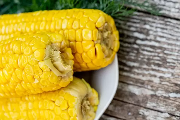 Fresh ripe boiled corn close-up