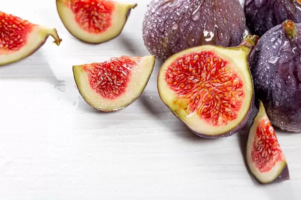 Fresh, ripe figs with water drops