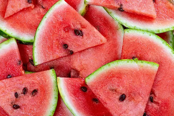 Fresh ripe watermelon slices background (Flip 2019)