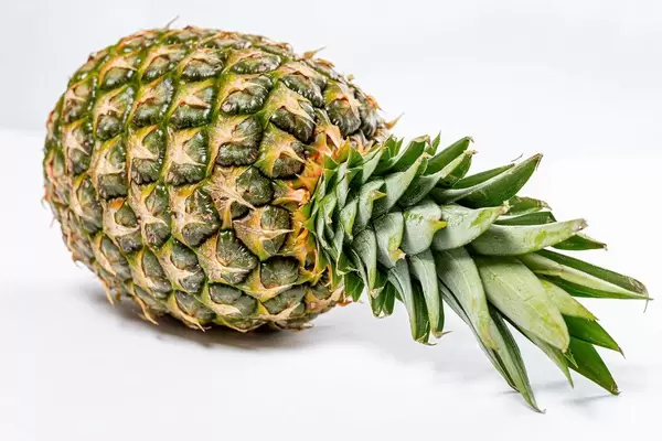 Fresh ripe whole pineapple on white background (Flip 2019)