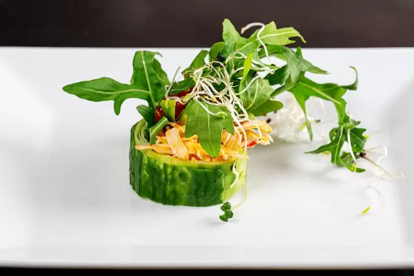 Fresh-roll with snow crab, arugula, cucumber and micro greenery