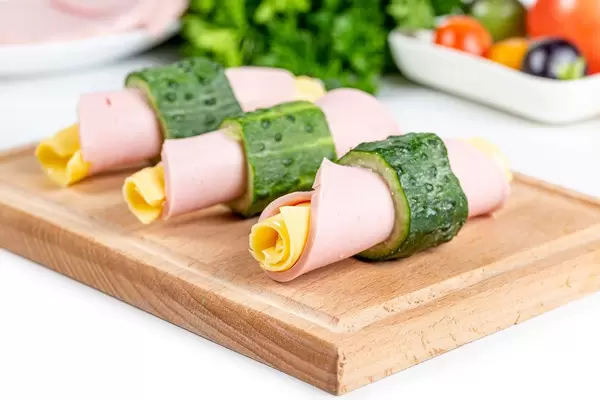Fresh rolls with cucumber, cheese, sausage and parsley