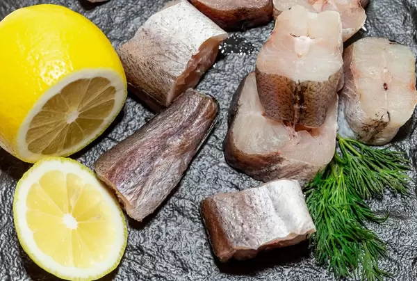 Fresh sea fish with lemon slices and dill  Flip 2019