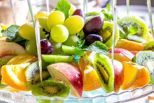 Fresh sliced fruit with mint leaves (Flip 2019)