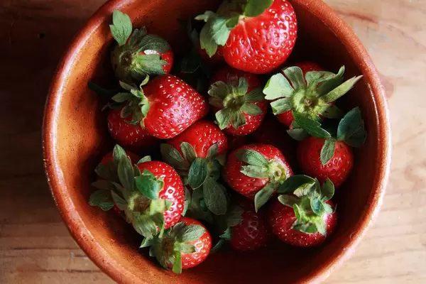Fresh Strawberries in a Ceramic Bowl