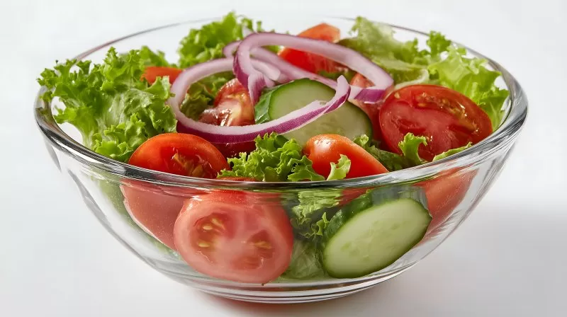 Fresh vegetable salad with tomato cucumber and red onion